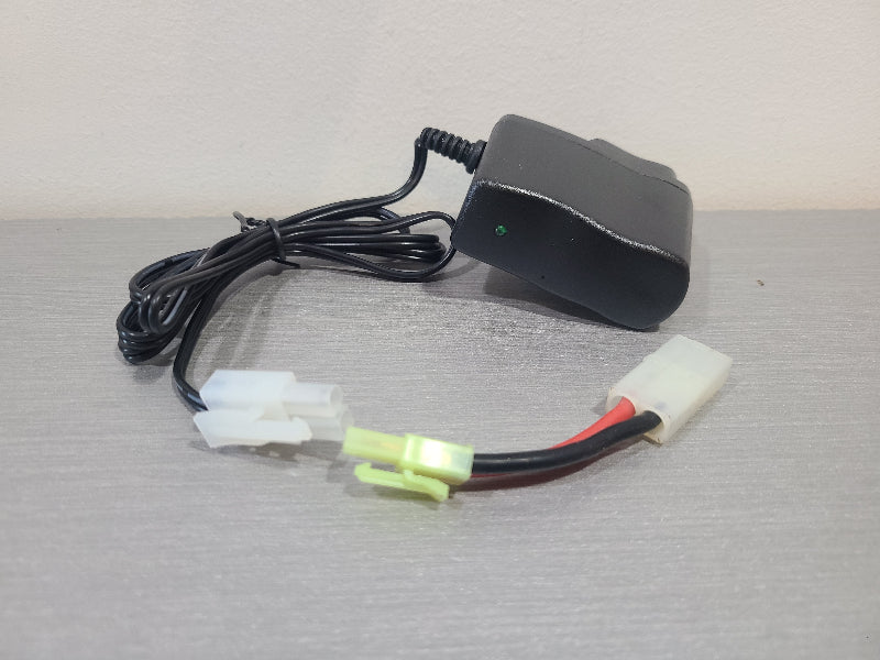 District Airsoft airsoft battery charger black AC adapter with multiple Tamiya connectors on gray surface