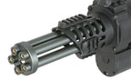 Close-up of WELL PRO MINIGUN AIRSOFT AEG with black rotating barrel and detailed casing